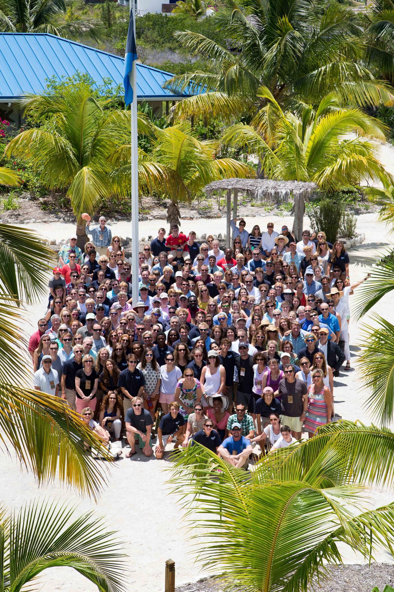 A group shot of The Island School students, staff, CEI researchers, and visiting parents.