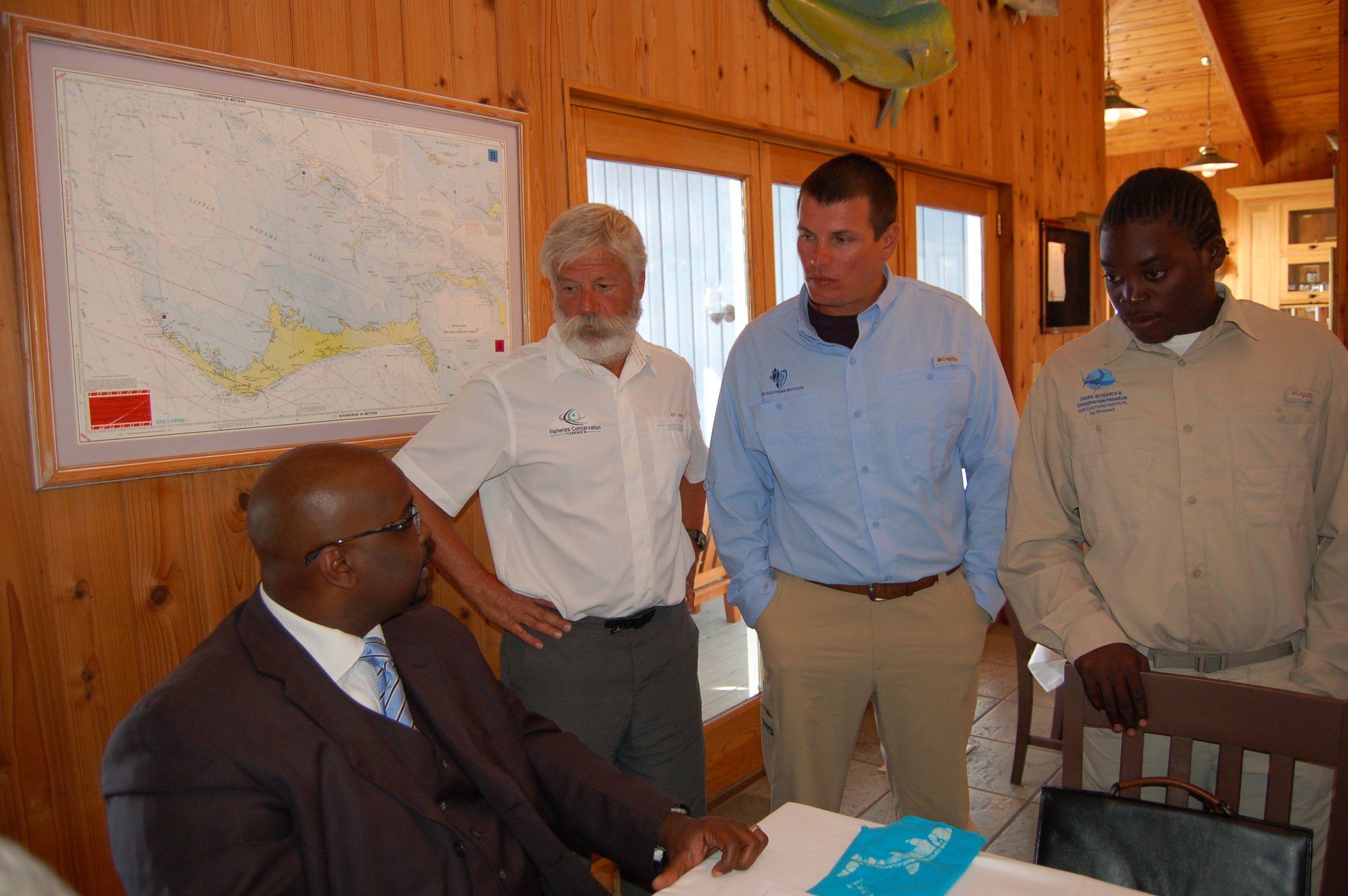 Aaron Shultz, David Philipp, and Malcolm Goodwin with the Prime Minister of the Bahamas
