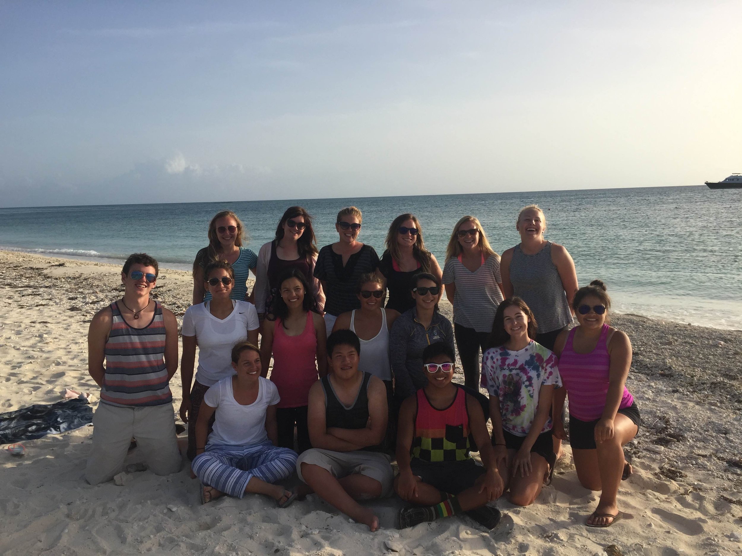 Earthwatch Volunteers, Leaders and Interns enjoy each others company at a farewell beach bbq