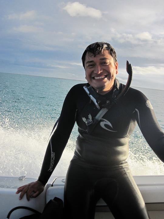 PhD Student from SFU Luis ready to dive for lionfish.