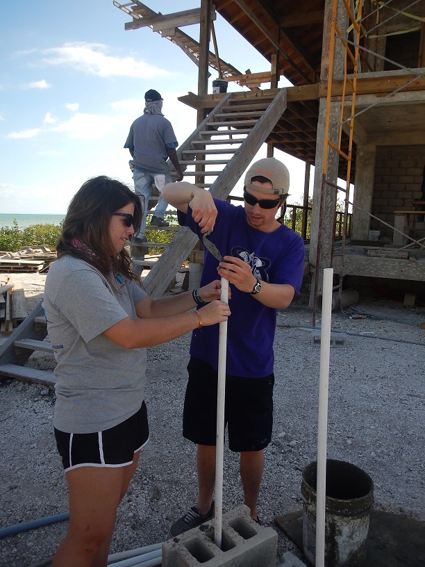 The interns help construct a new BRUVs for use in the tidal creeks.